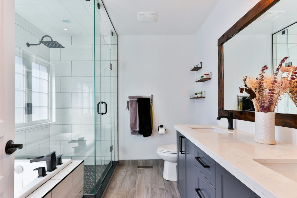 Clean modern bathroom with shower and vanity