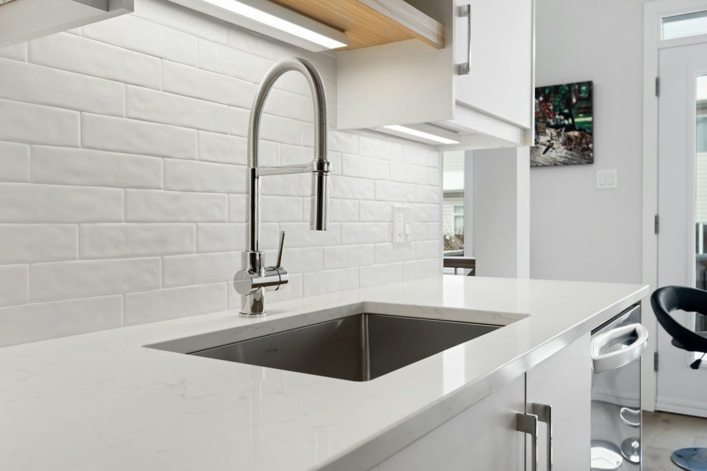 Kitchen sink beneath a window
